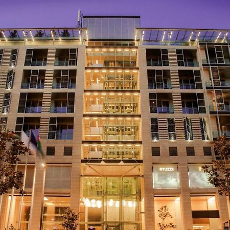 The Abdali Boulevard Hotel Amman Exterior photo The hotel at night