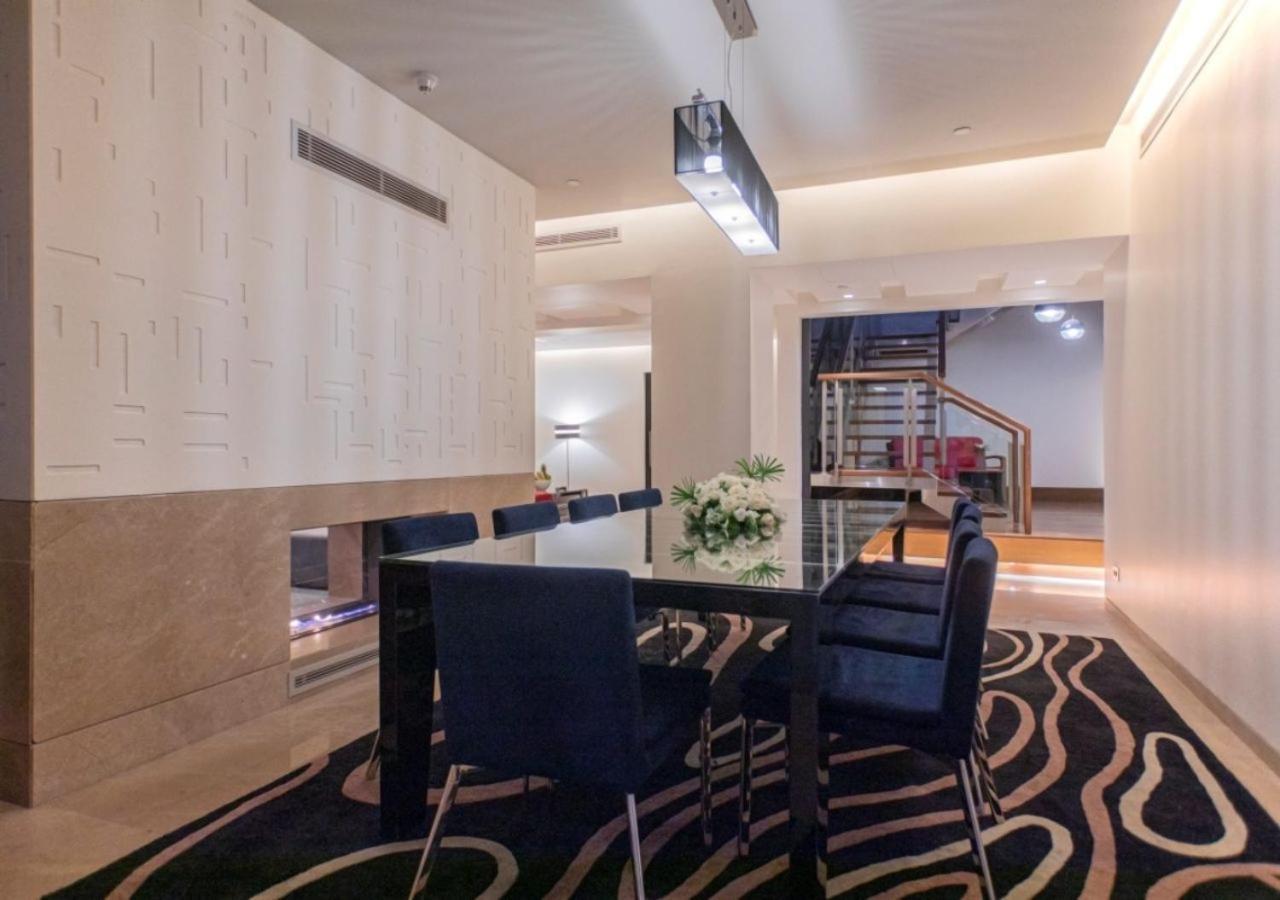 The Abdali Boulevard Hotel Amman Exterior photo A modern dining room
