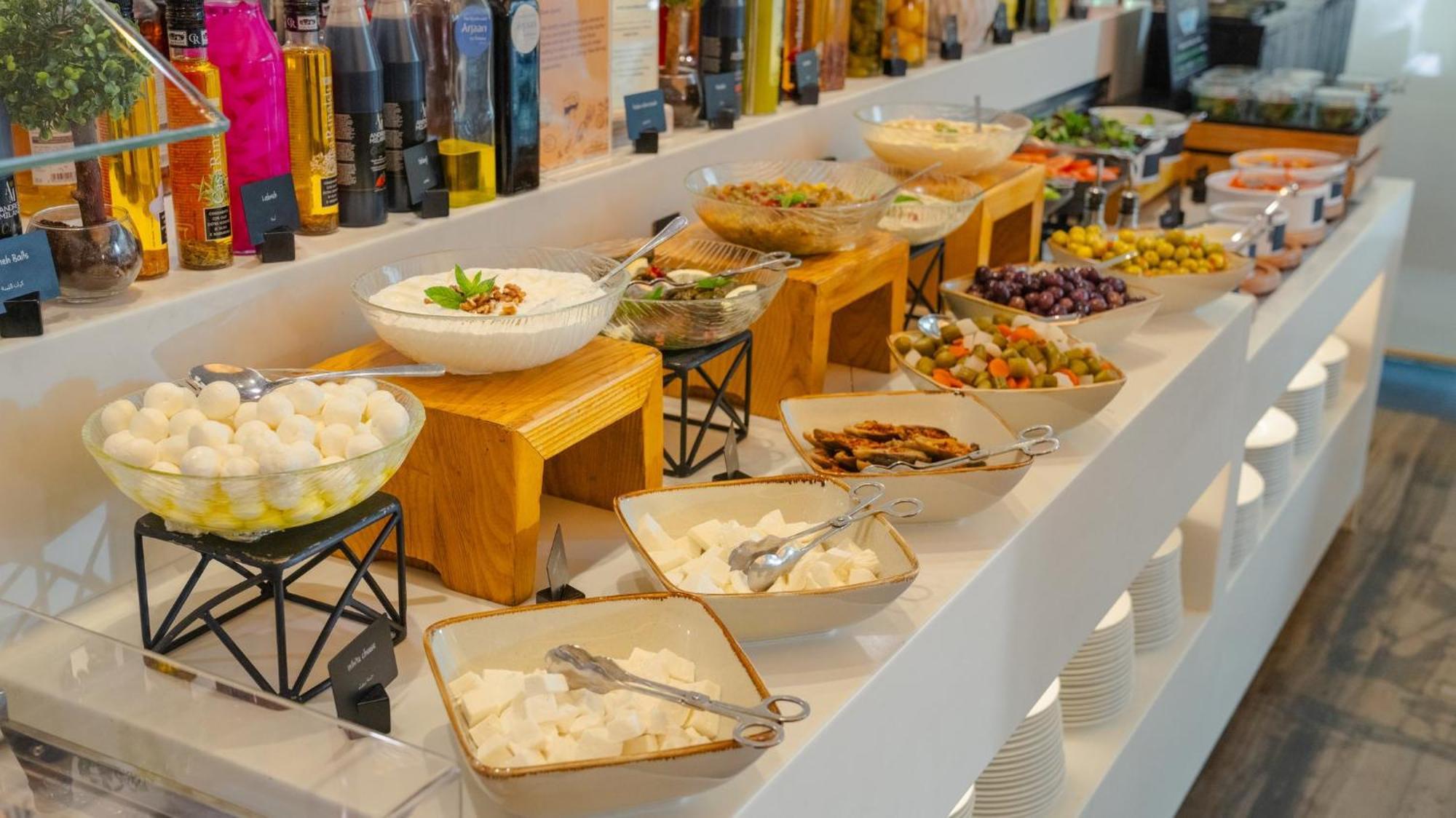 The Abdali Boulevard Hotel Amman Exterior photo A selection of Greek meze